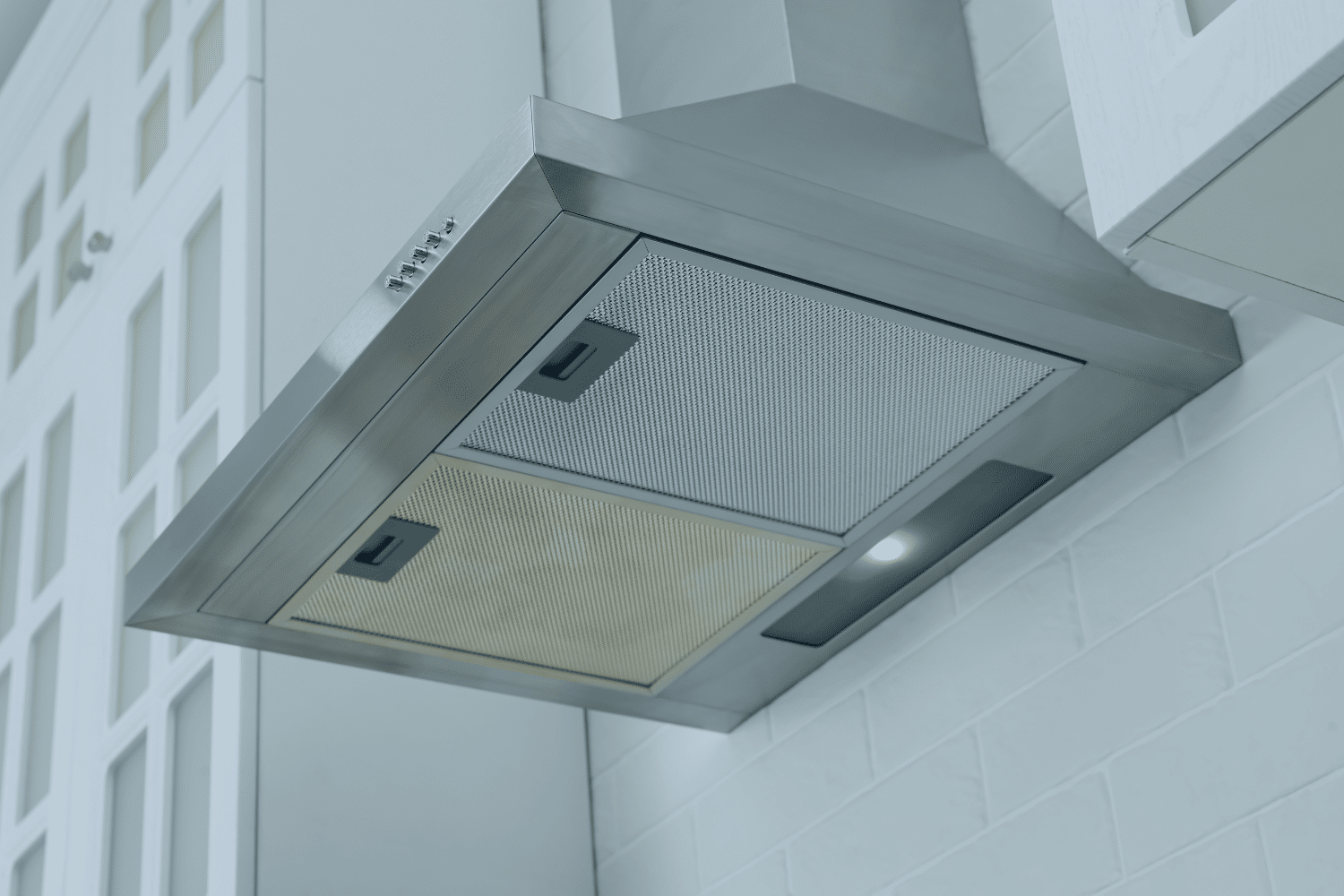 how does a ductless range hood work
