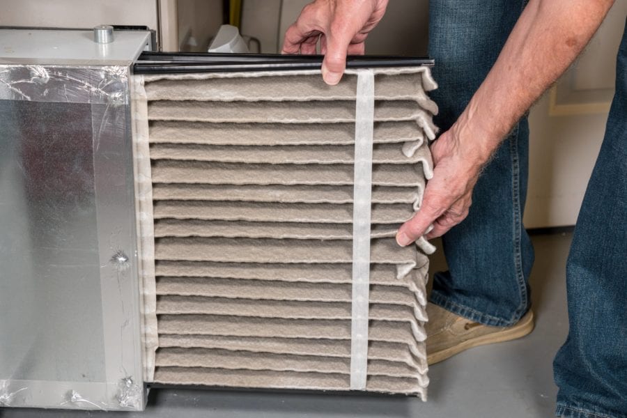 large metal furnace compartment next to the blower, near the bottom of the door or on the side of the door. Now, it depends on how the furnace was installed as to where the filter is located: