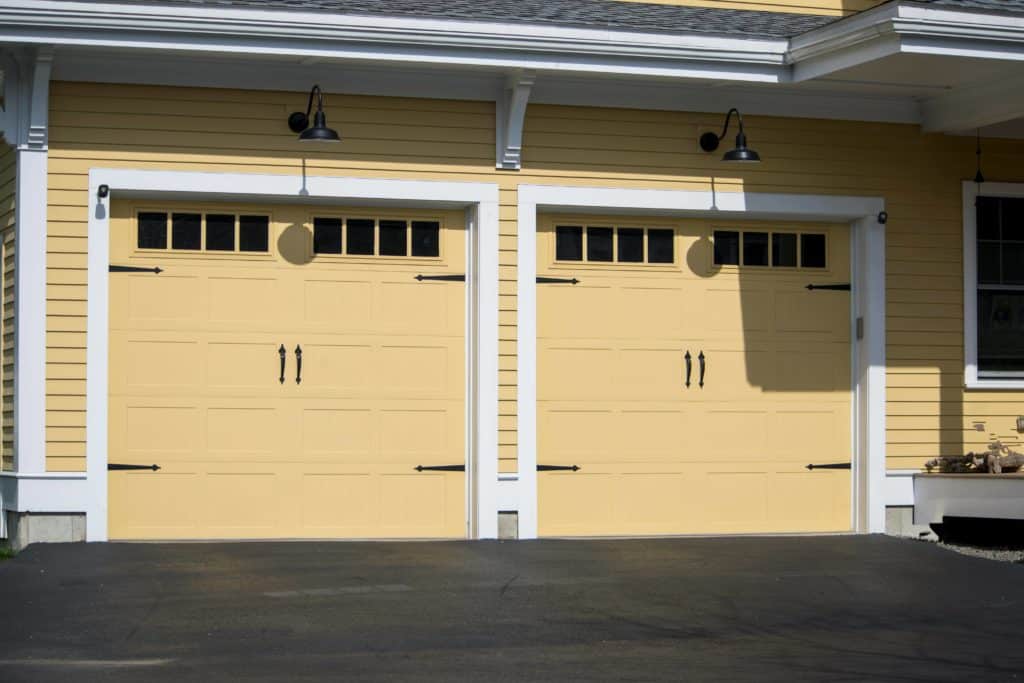 Light garage door colors reduce the amount of heat absorbed. 