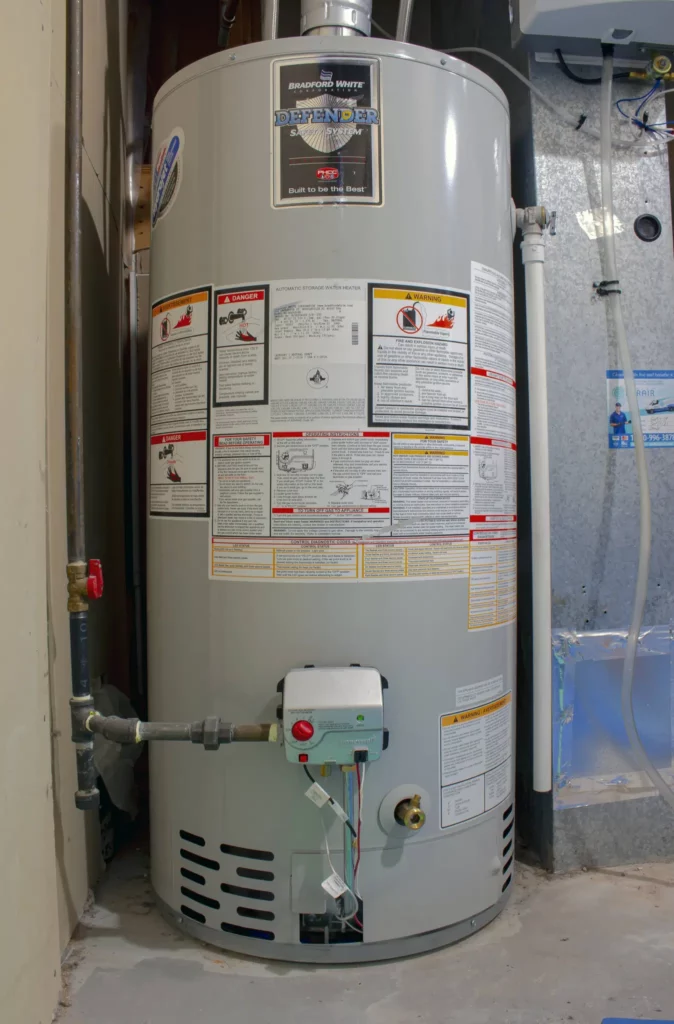 Hot water heater in a warm place to avoid freezing. 